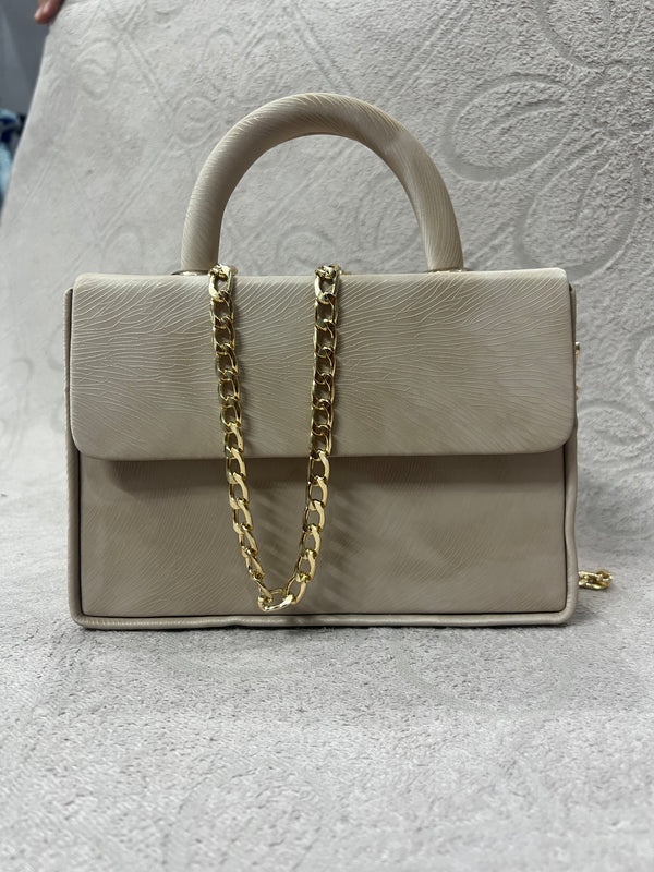 Off-White Textured Handbag with Gold Chain Accent
